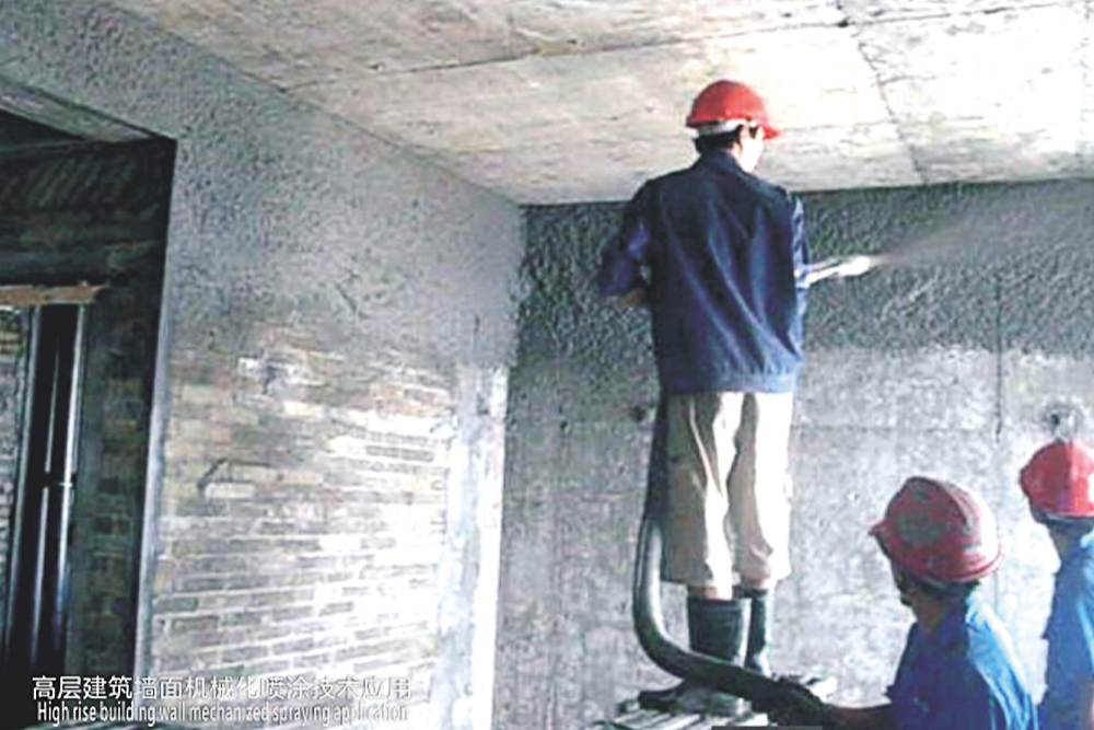 Construction site of wall spray coating with cement-based and gypsum based mortar surface layer